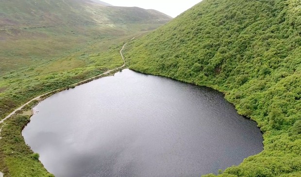 Aerial shots of a Mountain Lake in Ireland
