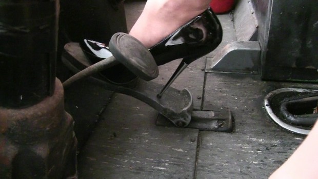 331 : Miss Iris pumping very old bus pedals