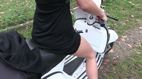 246 : Miss Black Mamba plays with the Vespa