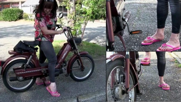 114 : Miss Vicky cranks and revs the old moped Garelli