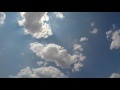 00269_GoPro Hero 4 footage blue sky with white puffy clouds time lapse