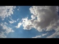 00236_GoPro Hero 4 footage blue sky with white puffy clouds time lapse