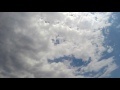 00238_GoPro Hero 4 footage blue sky with white puffy clouds time lapse