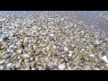 00210_GoPro Hero 4 footage beach side stones pebble and sea water