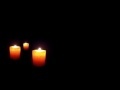 00198_GoPro HERO 4 raw footage 3 candles black background seamless loop