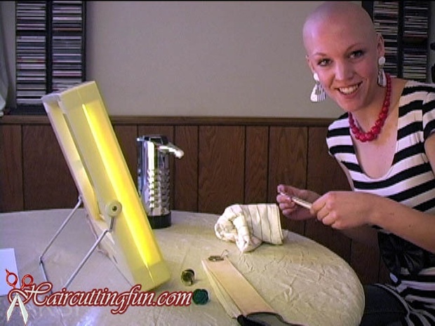 Woman shaving her face straight-edge razor